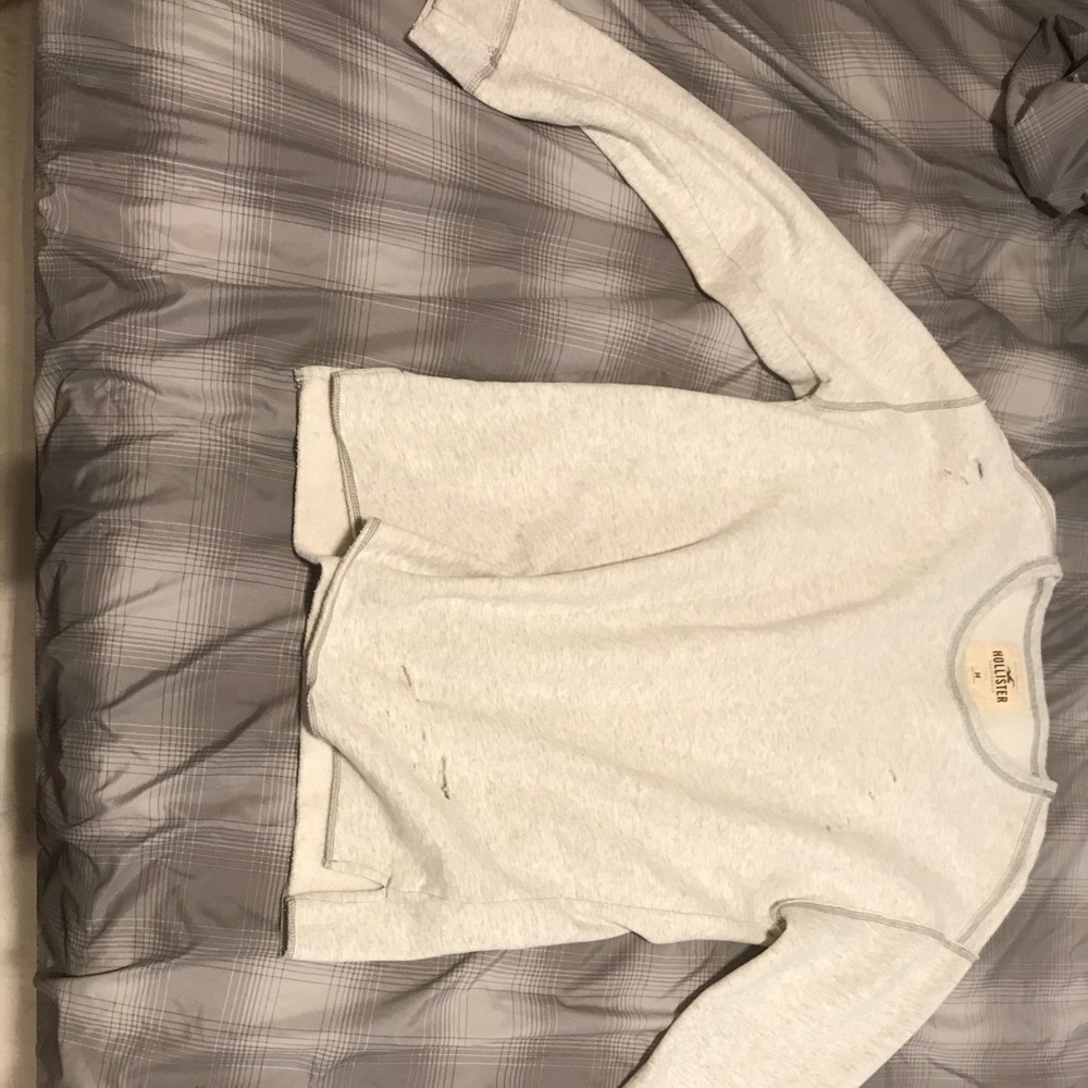 Long sleeve distressed Hollister shirt.